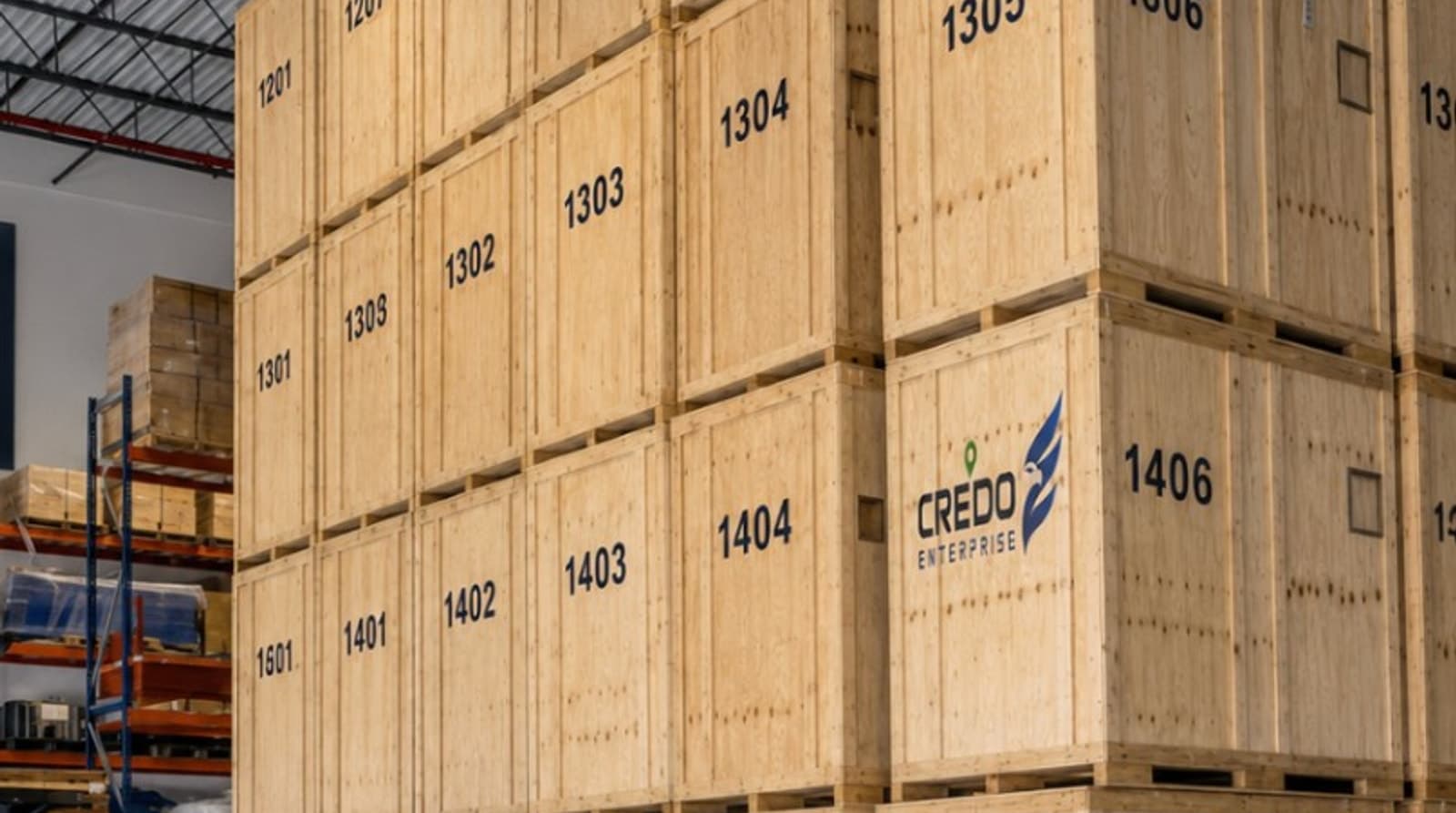 Credo Enterprise branded wooden storage vaults in a warehouse setting